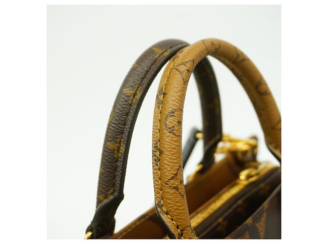 Borsa a mano OnTheGo EW con catena Monogram Giant Reverse Louis Vuitton Marrone - vista 7