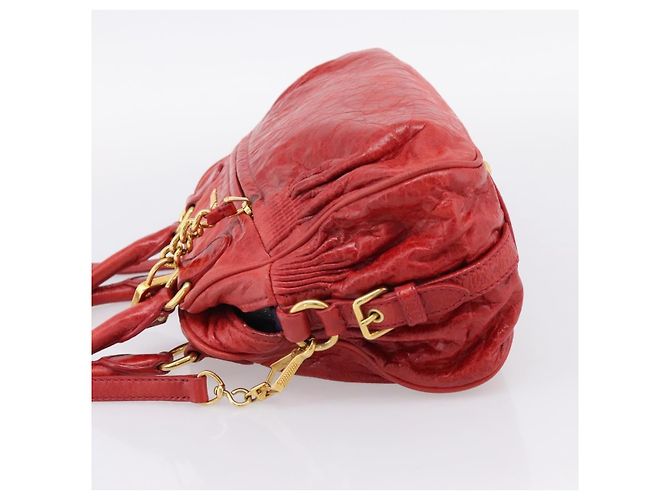 Bolso Convertible Coffer Miu Miu de Piel Matelassé Medium Roja - vista 5