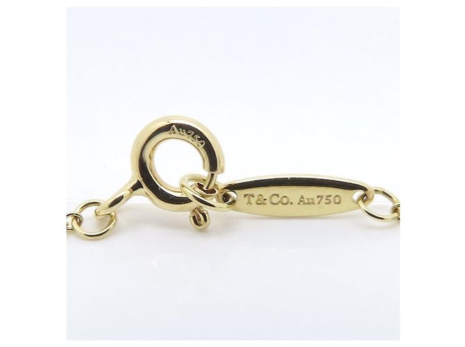 Autre Marque Bracciale con charm Tiffany & Co. in oro giallo 18K - vista 4