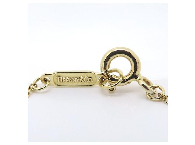 Autre Marque Collier Tiffany Roman Cross en or jaune 18K - vue 6