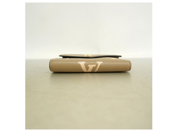 Cartera Tri-fold Louis Vuitton en Tourterelle y Cream Gris Crudo - vista 2