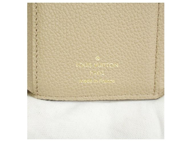 Cartera Tri-fold Louis Vuitton en Tourterelle y Cream Gris Crudo - vista 4