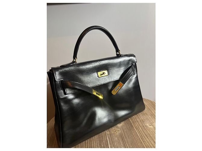 Borsa Hermès Kelly in pelle box nera retourné - vista 17