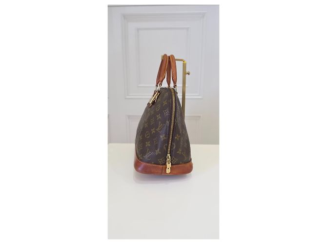 Bolso Louis Vuitton Alma Monogram - vista 2