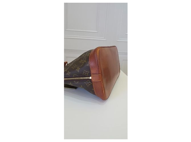 Bolso Louis Vuitton Alma Monogram - vista 4