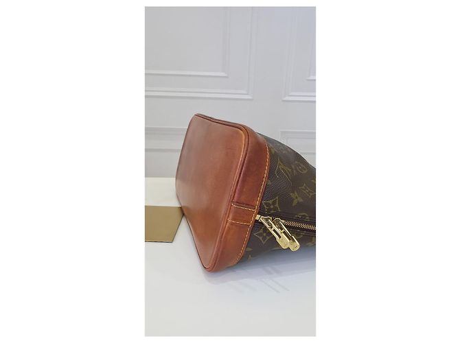 Bolso Louis Vuitton Alma Monogram - vista 5