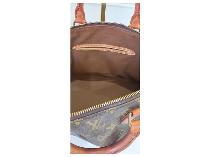 Bolso Louis Vuitton Alma Monogram - vista 9