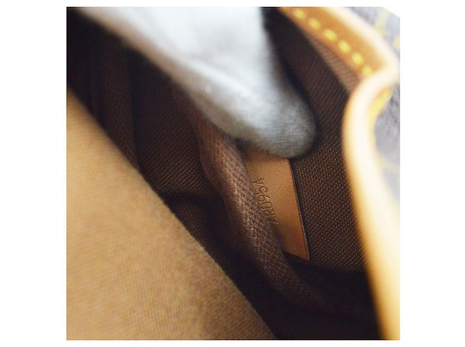 Louis Vuitton Saumur Monogram Canvas 30 Brown - view 5