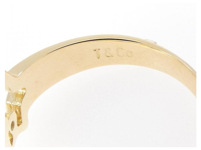 Autre Marque Anello fede Tiffany in oro giallo 18K e diamanti - vista 4