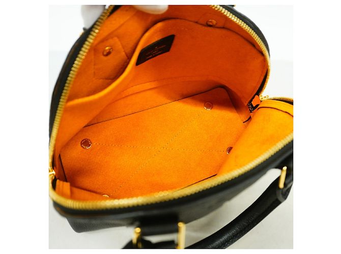 Bolsa Louis Vuitton Monogram Empreinte Neo Alma BB - vista 4