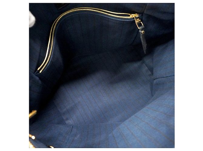 Sac cabas Louis Vuitton Monogram Empreinte Lumineuse PM - vue 4