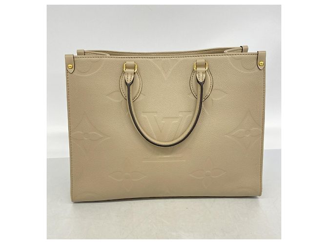Bolso Tote Louis Vuitton Monogram Empreinte OnTheGo MM - vista 10
