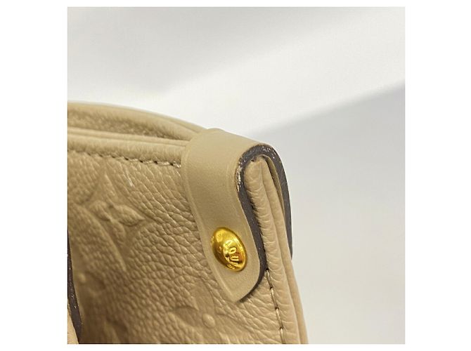 Bolso Tote Louis Vuitton Monogram Empreinte OnTheGo MM - vista 7
