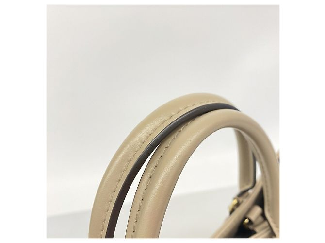 Bolso Tote Louis Vuitton Monogram Empreinte OnTheGo MM - vista 8