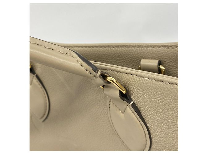Bolso Tote Louis Vuitton Monogram Empreinte OnTheGo MM - vista 9