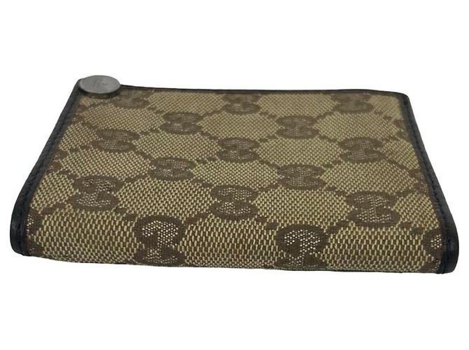 Tarjetero bi-fold de cuero y lona GG GUCCI - vista 4