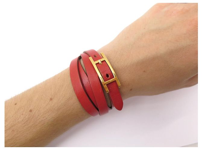 Hermès BRACCIALE HERMES BEHAPI CUIR SWIFT ROUGE BRIQUE & GOLD REVERSIBLE QUADRUPLE TOUR - vista 16