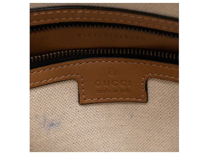 GUCCI - Gucci Bauletto Schultertasche aus schwarzem monogrammiertem Canvas und braunem Leder - Ansicht 10