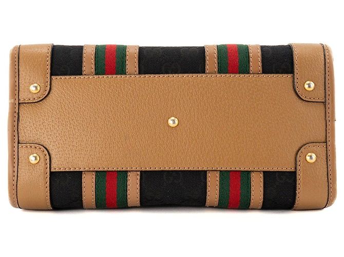 GUCCI - Gucci Bauletto Schultertasche aus schwarzem monogrammiertem Canvas und braunem Leder - Ansicht 4