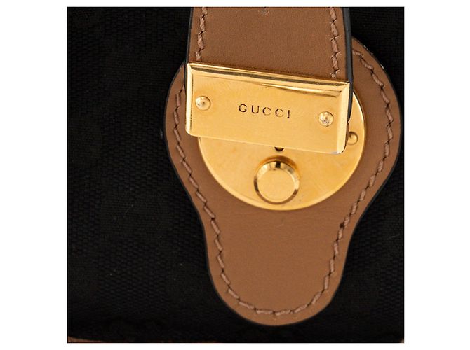 GUCCI - Gucci Bauletto Schultertasche aus schwarzem monogrammiertem Canvas und braunem Leder - Ansicht 7