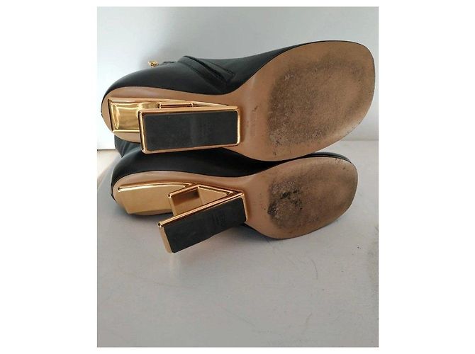 Fendi black leather ankle boots with gold heel. - view 10