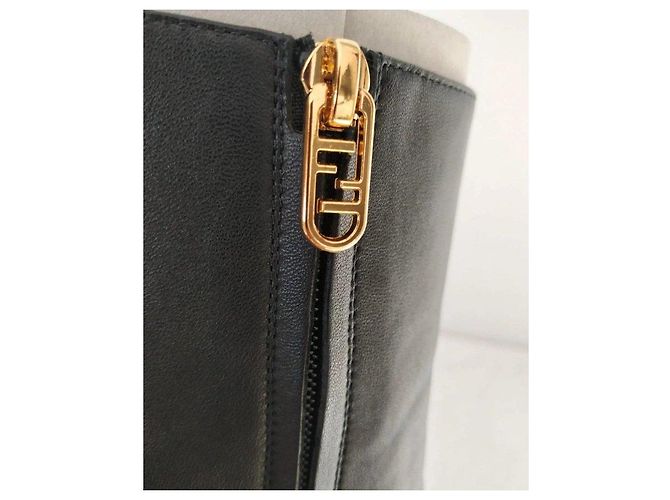 Fendi black leather ankle boots with gold heel. - view 13