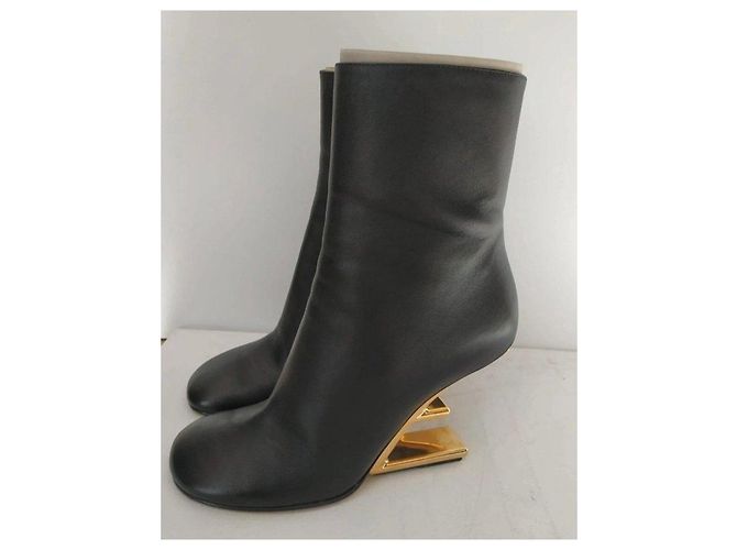 Fendi black leather ankle boots with gold heel. - view 15