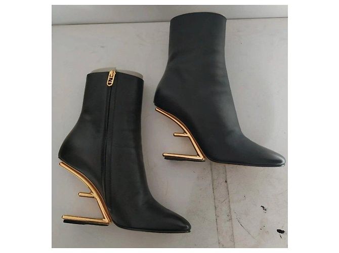 Fendi black leather ankle boots with gold heel. - view 17