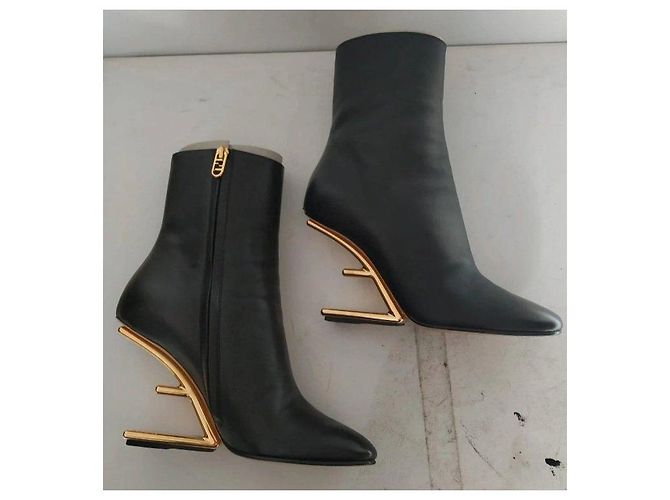 Fendi black leather ankle boots with gold heel. - view 18