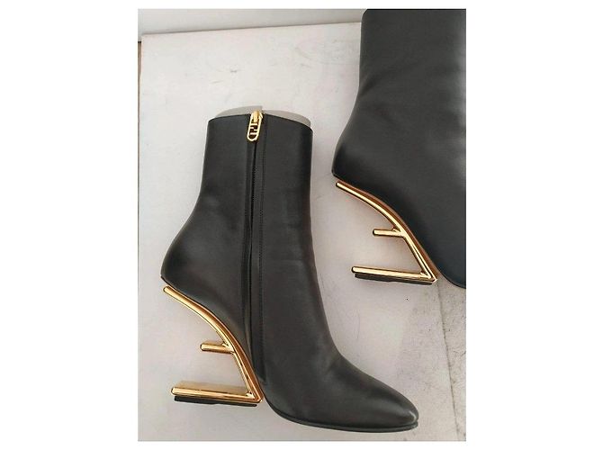 Fendi black leather ankle boots with gold heel. - view 7