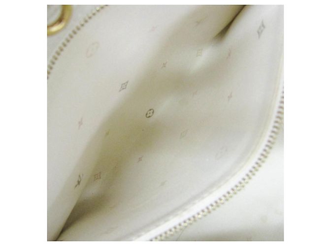 Bolso Louis Vuitton Monogram Spring In The City On the Go MM - vista 17