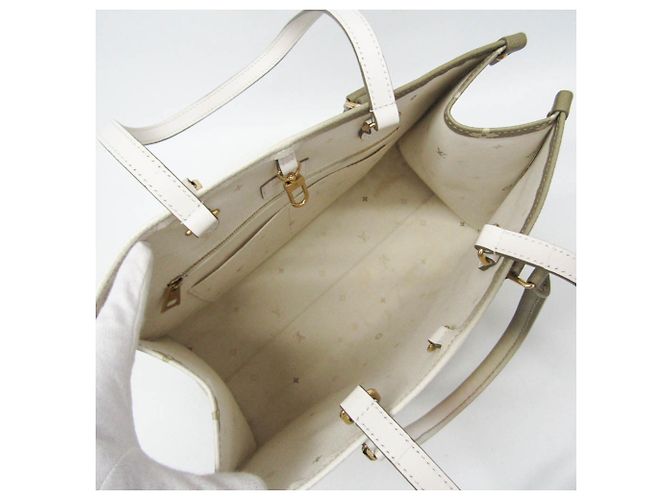 Bolso Louis Vuitton Monogram Spring In The City On the Go MM - vista 3
