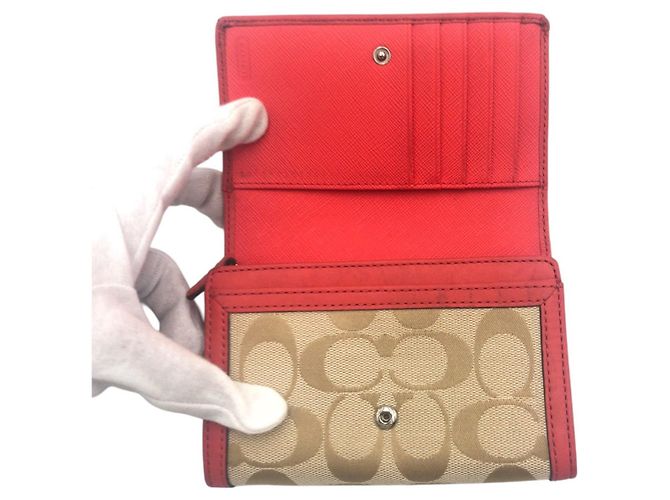 Portafoglio bi-fold in pelle e tela Signature COACH - vista 10