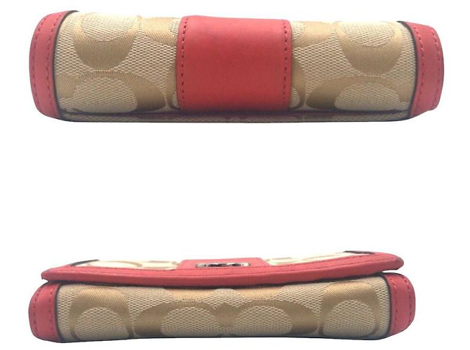 Portafoglio bi-fold in pelle e tela Signature COACH - vista 9