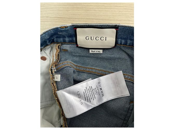 Calças Jeans Gucci em denim azul com bordado de morango - vista 3