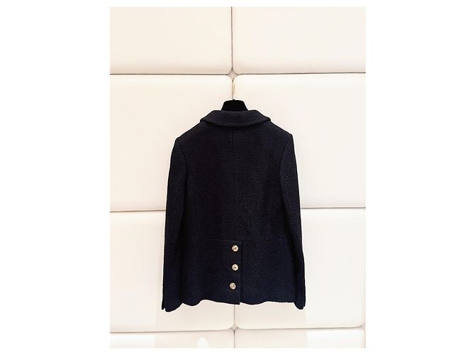 Chaqueta Chanel 21P de tweed negra y dorada cruzada - vista 2
