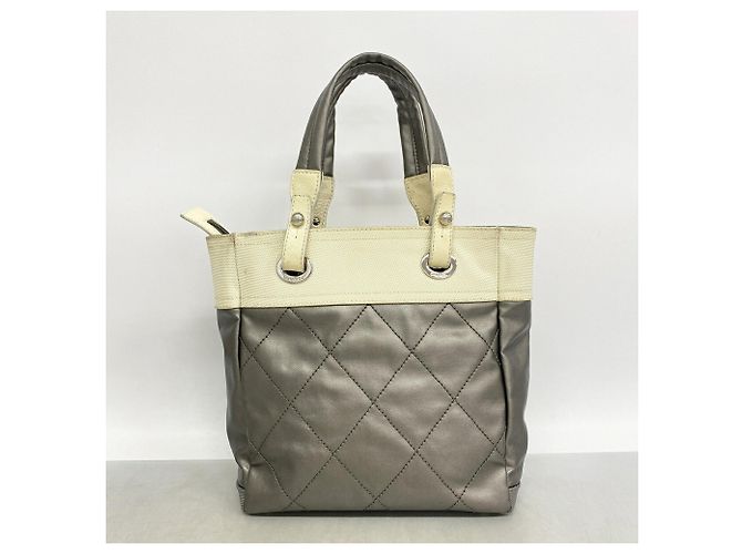 Bolso Tote Chanel en Marfil y Plata - vista 11