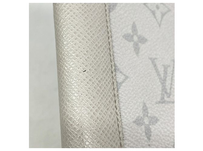 Louis Vuitton Taiga Zippy Wallet Vertical M30446 - vista 7