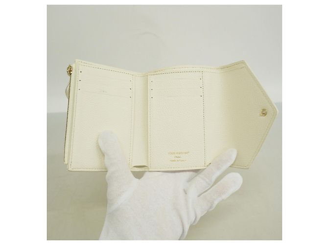 Portafoglio Louis Vuitton Tri-fold in Peach - vista 3