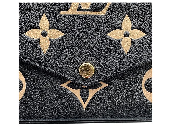 Portafoglio con catena Louis Vuitton - Bicolor Monogram Empreinte - vista 9