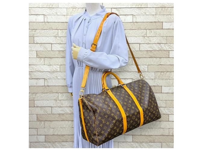 mala Louis Vuitton Keepall 50 Bandoulière Monogram - vista 2