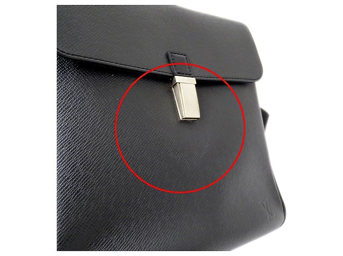 Louis Vuitton Taiga Leather Handbag - view 10