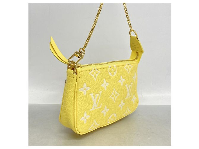 Louis Vuitton Monogram Empreinte Bicolor Mini Pochette Accessoires - vista 2