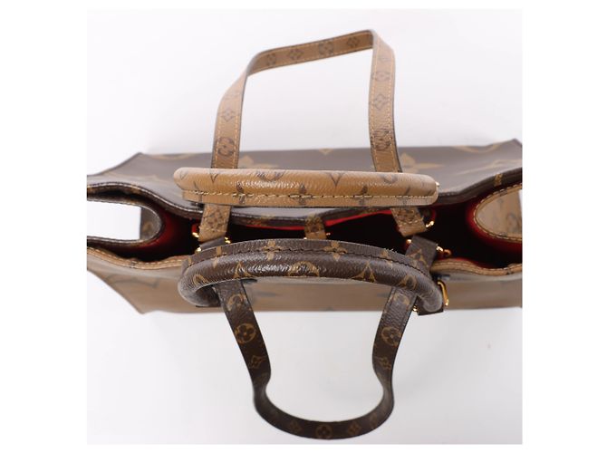 Bolsa 2Way Louis Vuitton OntheGo MM Giant Monogram Reverse em marrom M45039 - vista 6