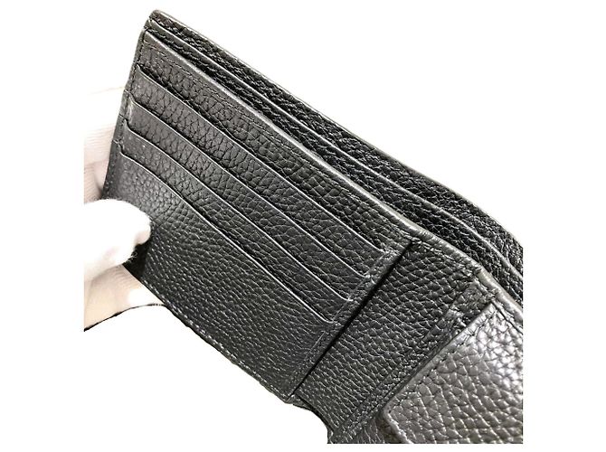 Portafoglio bi-fold Maxi GG di Gucci - vista 9