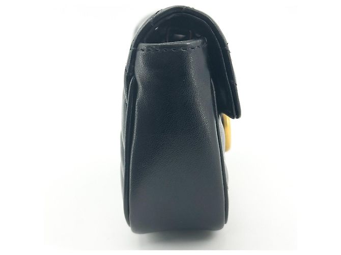 Mini borsa in pelle matelassé GG Marmont di Gucci - vista 4
