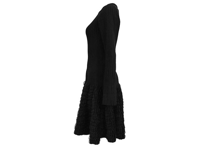 Vestido mini de manga comprida em malha canelada Alaïa em lã preta - vista 2