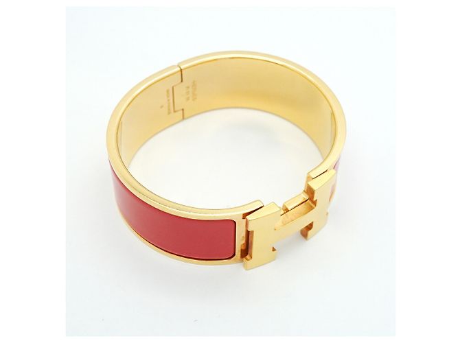 Bracciale Hermès Clic Clac GM in Oro e Rosso - vista 2