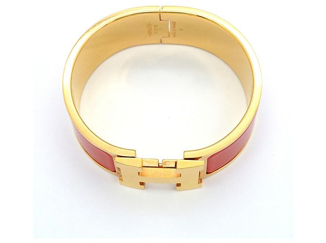 Bracciale Hermès Clic Clac GM in Oro e Rosso - vista 3