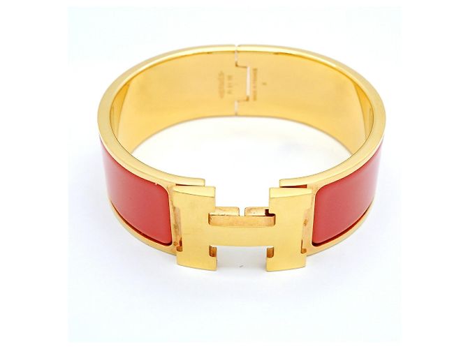 Bracciale Hermès Clic Clac GM in Oro e Rosso - vista 4